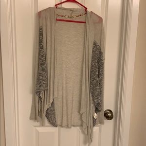 Thin, soft sweater with grey sides